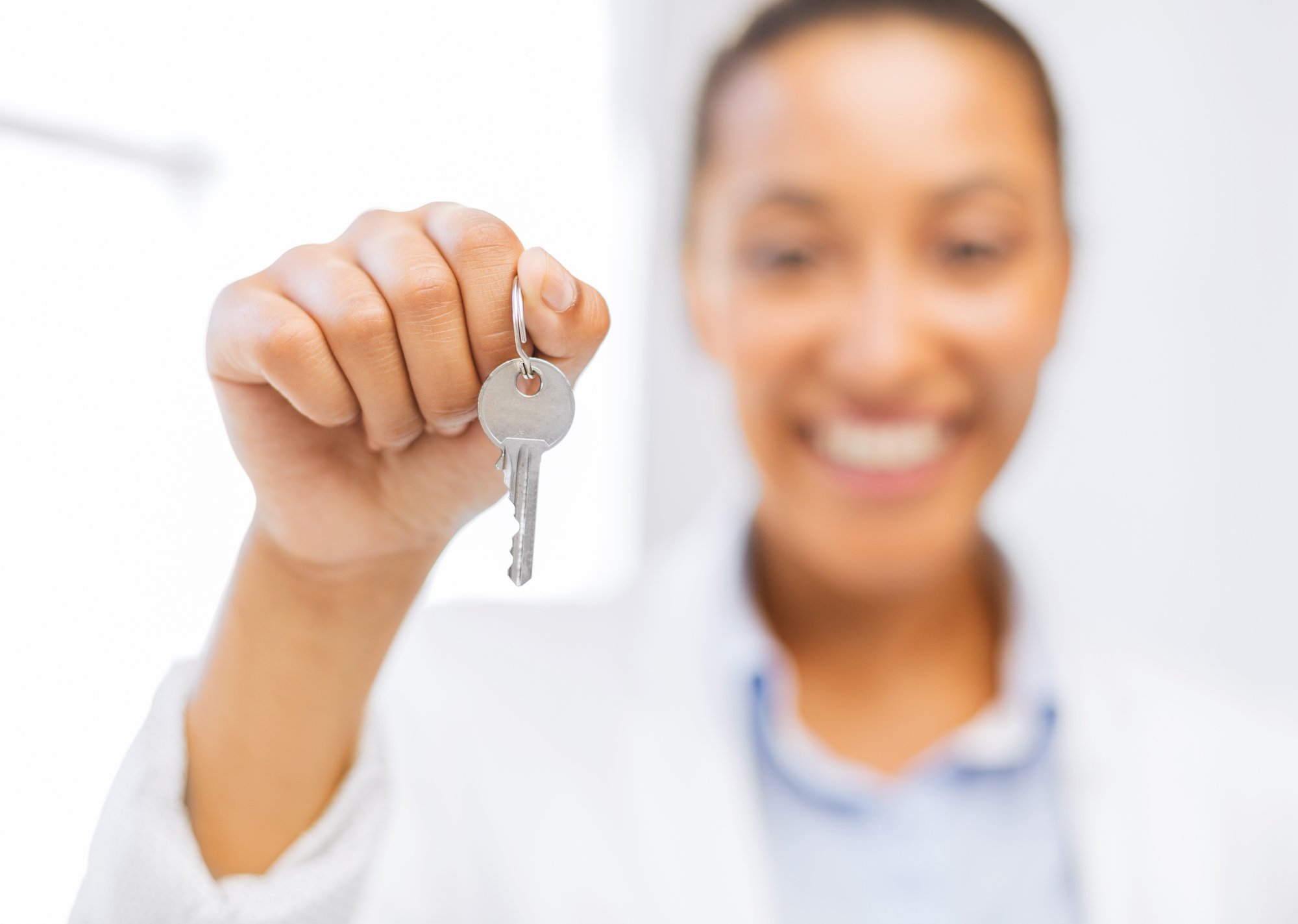 Woman hand holding house keys